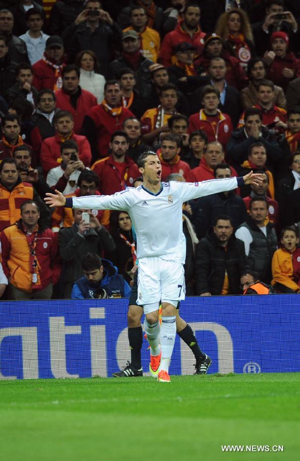 Real Madrid's Cristiano Ronaldo celebrates after scoring during the UEFA Champions League quarter final second leg soccer match between Galatasaray and Real Madrid in Istanbul, Turkey, April 9, 2013. Real Madrid lost 2-3 but entered the semifinal with a total result 5-3.(Xinhua/Ma Yan)