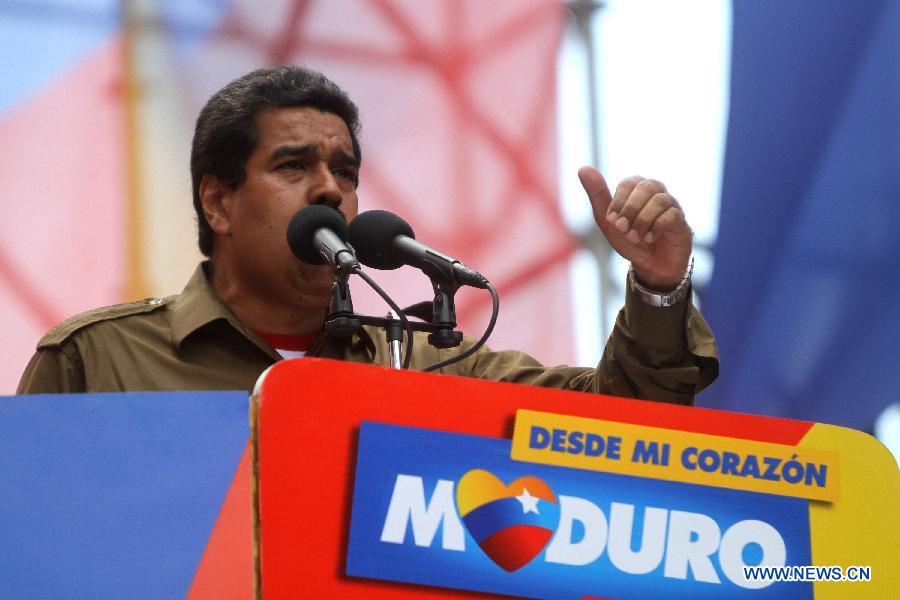 Venezuelan Acting President and presidential candidate Nicolas Maduro attends a rally at Miraflores, in Caracas, capital of Venezuela, on April 9, 2013. Venezuela will hold presidential elections on April 14.(Xinhua/AVN)