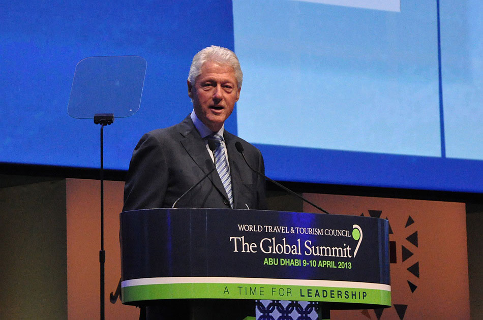 Bill Clinton, Founder of William J. Clinton Foundation and 42nd President of the United States, delivers a speech at 2013 World Travel & Tourism Council (WTTC) Global Summit on April 9 in Abu Dhabi. (People's Daily Online/ Yao Chun)