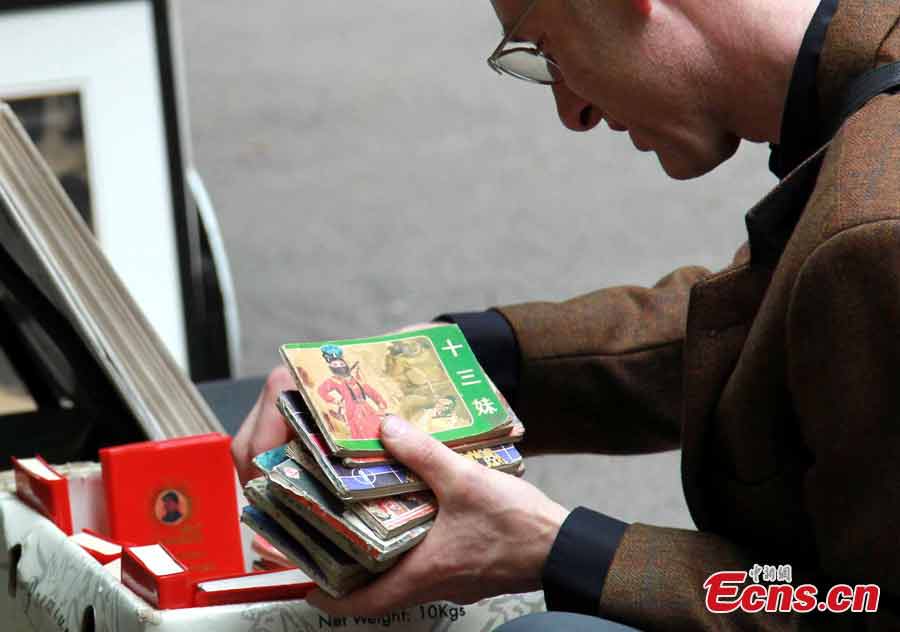 A foreigner shops in Upper Lascar Row in Hong Kong, April, 8, 2013. The Upper Lascar Row is parallel to the Hollywood Road in Sheung Wan and today, is an awesome alleyway for antiques and rare finds in all of Hong Kong.