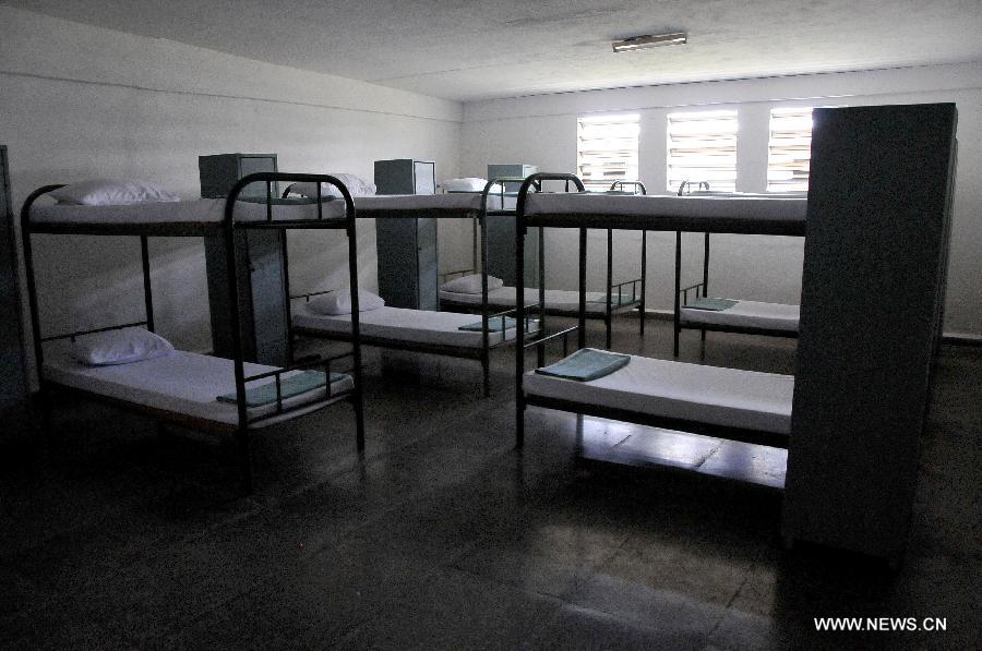 Inmates' dormitory is seen at the Re-education Center for San Francisco de Paula Youth, in San Miguel del Padron municipalty, in Havana, Cuba, on April 9, 2013. Local and foreign media representatives made a tour in the Women's Prison and Re-education Center for San Francisco de Paula Youth. (Xinhua/Joaquin Hernandez)