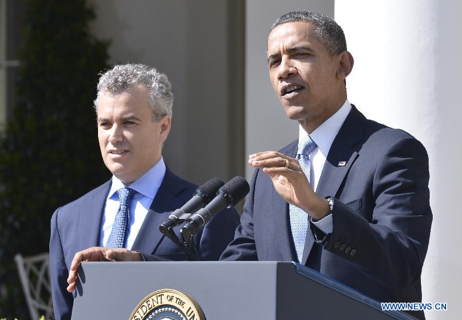 U.S. President Barack Obama (R) delivers a speech on the 2014 budget plan, as Jeffrey Zients, acting director of the Office of Management and Budget (OMB), stands by in the Rose Garden of the White House in Washington D.C., capital of the United States, April 10, 2013. U.S. President Barack Obama on Wednesday unveiled his budget plan, proposing 3.78 trillion dollars in spending for the 2014 fiscal year and 1.8 trillion deficit reduction over the next decade. (Xinhua/Zhang Jun) 