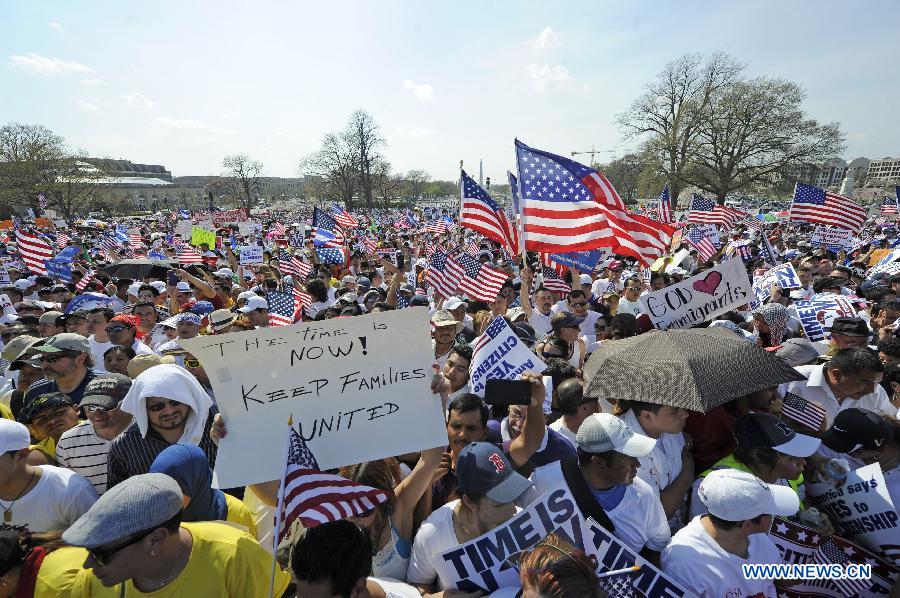 Immigration reform supporters demonstrate in the "Rally for Citizenship" on the West Lawn of Capitol Hill in Washington D.C., capital of the United States, April 10, 2013. Two senior U.S. Senators, Democratic Senator Charles Schumer and Republican Senator John McCain, who are working together to broker an immigration reform plan on Sunday, expressed optimism that a bill could be ready within this week. (Xinhua/Zhang Jun) 