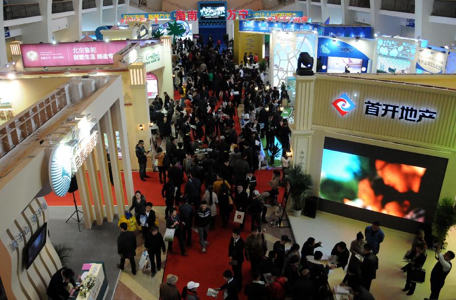 People visit 2013 Spring Beijing International Property Expo in Beijing, capital of China, April 11, 2013. The four-day expo kicked off on Thursday at Beijing Exhibition Centre. (Xinhua/Wang Zhen)
