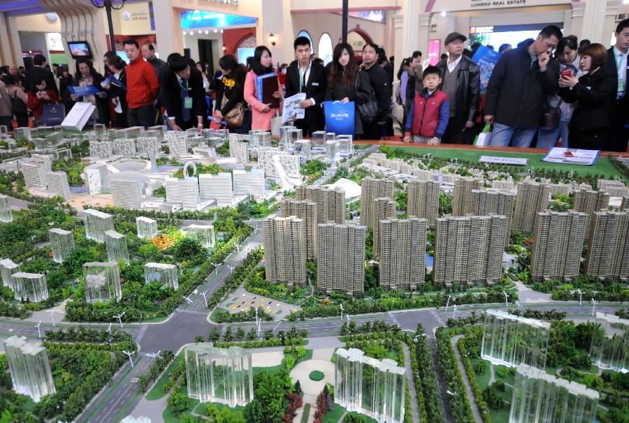 People visit 2013 Spring Beijing International Property Expo in Beijing, capital of China, April 11, 2013. The four-day expo kicked off on Thursday at Beijing Exhibition Centre. (Xinhua/Wang Zhen)