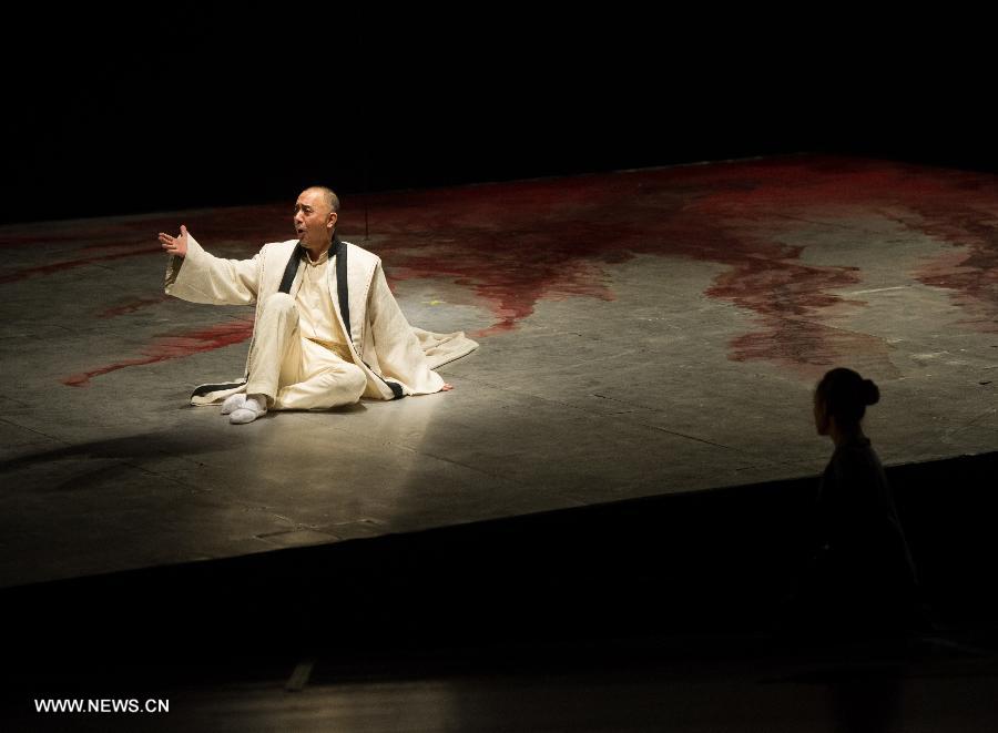 Actor Yao Lu performs during the stage drama "Oedipus the King" at the National Center for the Performing Arts in Beijing, capital of China, April 11, 2013. The drama which was directed by Li Liuyi, will be staged from April 11 to April 14. (Xinhua/Luo Xiaoguang)