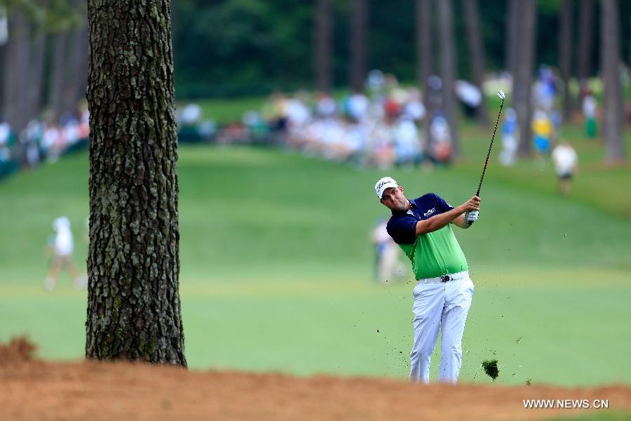 Marc Leishman of Australia competes during the first round of the 2013 Masters golf tournament at the Augusta National Golf Club in Augusta, Georgia, the United States, April 11, 2013. Leishman shot a 6-under par 66 on Thursday. (Xinhua/Chris Trotman/Augusta National)