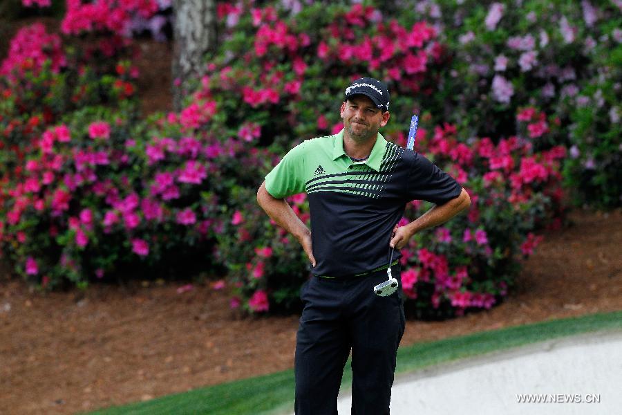 Sergio Garcia of Spain reacts during the first round of the 2013 Masters golf tournament at the Augusta National Golf Club in Augusta, Georgia, the United States, April 11, 2013. Garcia shot a 6-under par 66 on Thursday. (Xinhua/Hunter Martin//Augusta National)
