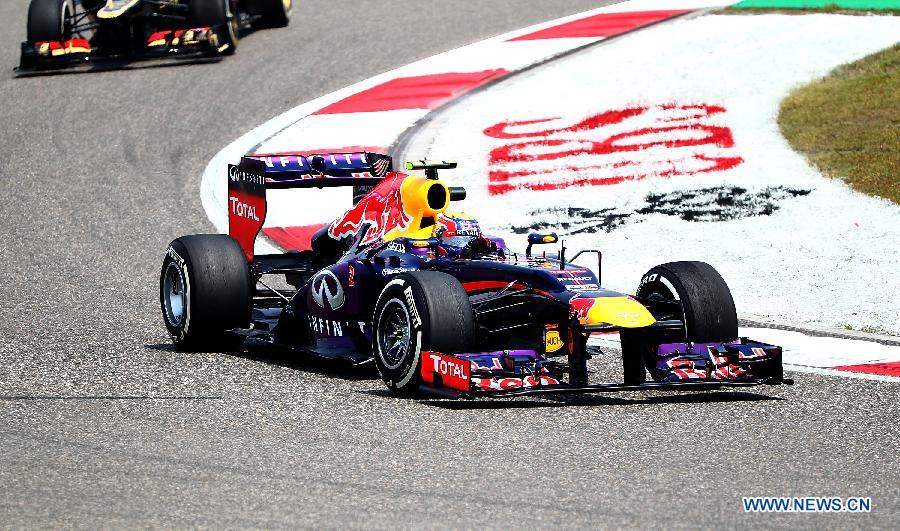 Red Bull driver Mark Webber drives during the first practice session of the Chinese F1 Grand Prix at the Shanghai International circuit, in Shanghai, east China, on April 12, 2013. (Xinhua/Li Ming)