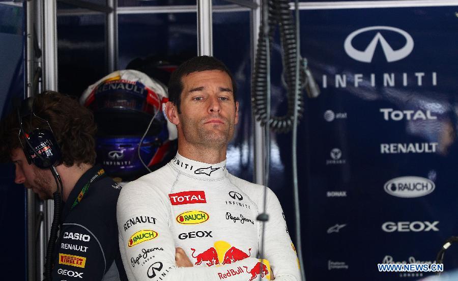 Red Bull driver Mark Webber prepares before the first practice session of the Chinese F1 Grand Prix at the Shanghai International circuit, in Shanghai, east China, on April 12, 2013. (Xinhua/Li Ming)