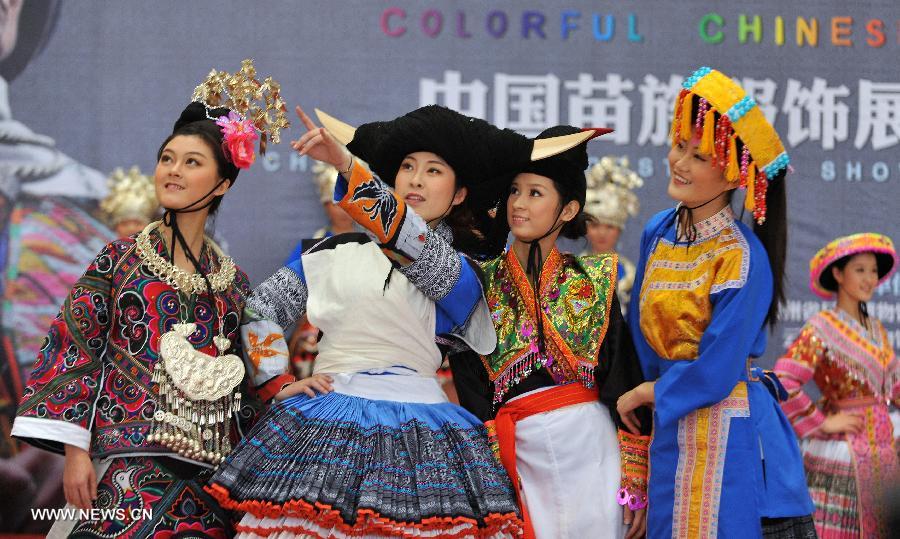 Models present costumes of the Miao ethnic group at the Guangxi Museum of Nationalities in Nanning, capital of south China's Guangxi Zhuang Autonomous Region, April 12, 2013. A total of 210 set of traditional costumes of the Miao ethnic group went on display here on Friday. Costumes of the Miao ethnic group is well known for its fine craftsmanship, brilliant colors, various styles and rich cultural connotations. (Xinhua/Lu Boan)