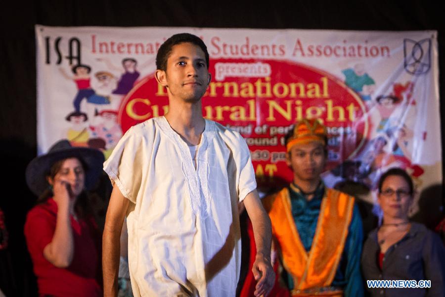 A student from Morocco participates in a fashion show in Jawaharlal Nehru University (JNU) in New Delhi, capital of India, April 12, 2013. International students from 14 countries and regions held a fashion show on Friday night on campus of the JNU in New Delhi. (Xinhua/Zheng Huansong)