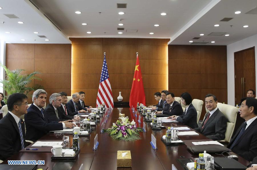 Chinese Foreign Minister Wang Yi (2nd R) and U.S. Secretary of State John Kerry (2nd L) hold talks in Beijing, capital of China, April 13, 2013. (Xinhua/Ding Lin)