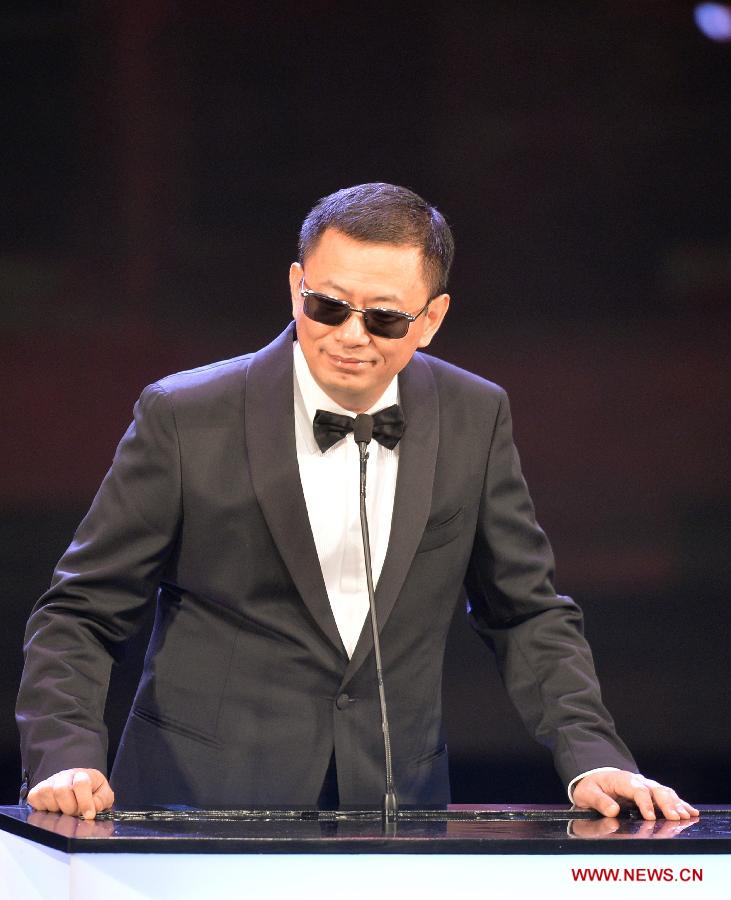 Karwai Wong attends the presentation ceremony of the 32nd Hong Kong Film Awards in south China's Hong Kong, April 13, 2013. (Xinhua/Chen Xiaowei)