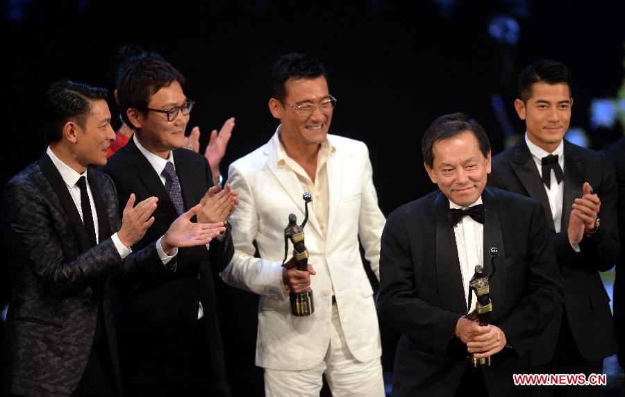 Cast members of the movie "Cold War" react after recieving the Best Movie award at the presentation ceremony of the 32nd Hong Kong Film Awards in south China's Hong Kong, April 13, 2013. (Xinhua/Chen Xiaowei)