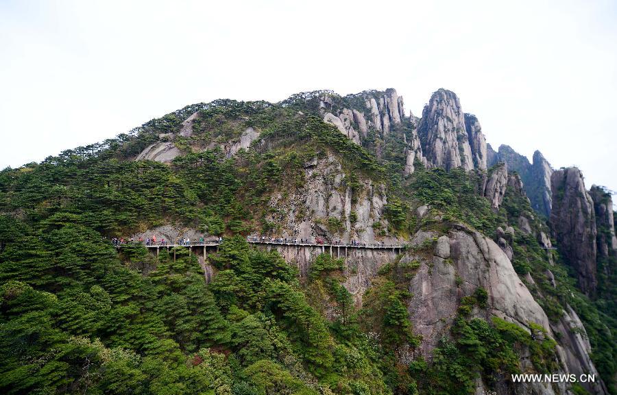 Photo taken on April 13, 2013 shows the scenery of the Sanqing Mountain in Shangrao City, east China's Jiangxi Province. The Sanqing Mountain is a renowned Taoist sacred moutain in Jiangxi Province. Sanqing means the "Three Pure Ones" in Chinese as the Sanqing Mountain is made up of three main summits: Yujing, Yuhua and Yuxu, representing the Taoist trinity. (Xinhua/Zhou Ke)