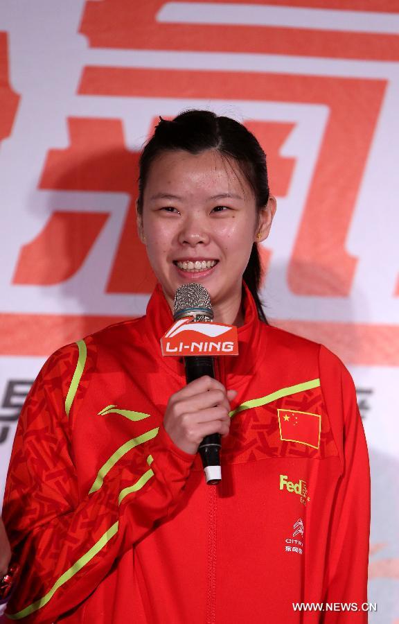 Olympic badminton gold medalist and world No. 1 Li Xuerui of China attends a brand promotion event in Taipei, southeast China's Taiwan, April 15, 2013, ahead of the Badminton Asia Championships which will be held in Taipei arena from April 16 to 21. (Xinhua/Xie Xiudong)