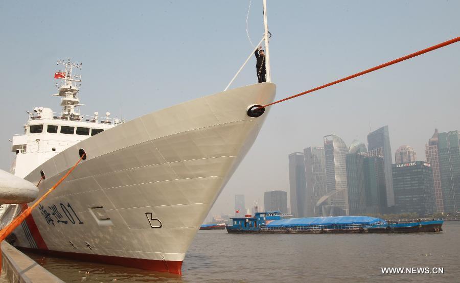 Patrol vessel Haixun01 is berthed at a port in Shanghai, east China, April 15, 2013. Haixun 01, soon to be put into service and managed by the Shanghai Maritime Bureau, is China's largest and most advanced patrol vessel. The 5,418-tonnage Haixun01 is 128.6 meters in length and has a maximum sailing distance of 10,000 nautical miles (18,520 km) without refueling. It will carry out missions regarding maritime inspection, safety monitoring, rescue and oil spill detection and handling. (Xinhua/Chen Fei) 