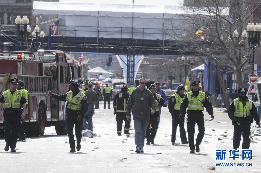 Three explosions occurred near the Boston Marathon finish line, killing at least 2 people, local media reported. (Xinhua/Zhao Xirong) 