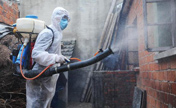 Staff members disinfects house of H7N9 positive