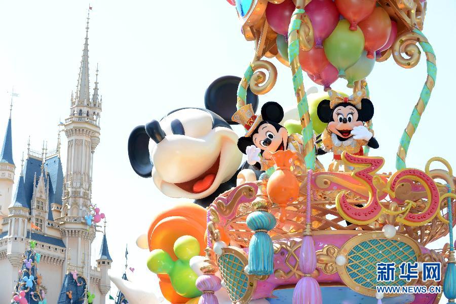 Performers dress up as cartoon figures in the Disneyland in Tokyo, Japan, on April 11. the celebrate the 30th anniversary of the Tokyo Disneyland, the 340-day celebration with float tour show at noon was started on April 11. Tokyo Disneyland will mark its 30th opening anniversary on April 15. (Xinhua/Ma Ping)