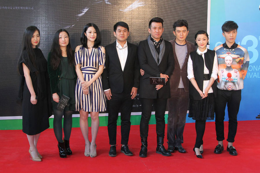 The film production crew attends the launch of the trailer of the new movie "Curse" at the 3rd Beijing International Film Festival at the China National Convention Center on Tuesday, April 16, 2013. The movie will be released nationwide in China during the summer season. [CRIENGLISH.com /Zhang Linruo]