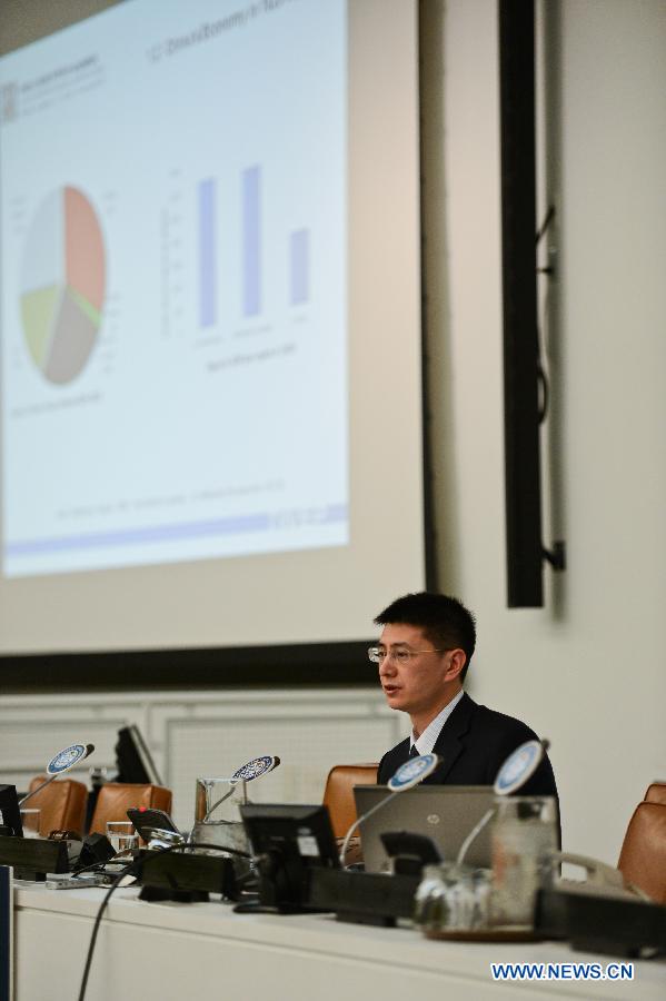 Yao Zhizhong, assistant director of the Institute of World Economics and Politics under the Chinese Academy of Social Sciences, gives a speech during the forum entitled "A China Story" at the UN headquarters in New York, on April 16, 2013. The forum held here Tuesday invited a group of Chinese experts to give their interpretations of China's overall planning approach and shared the country's experiences of pursuing sustainable development. (Xinhua/Niu Xiaolei) 