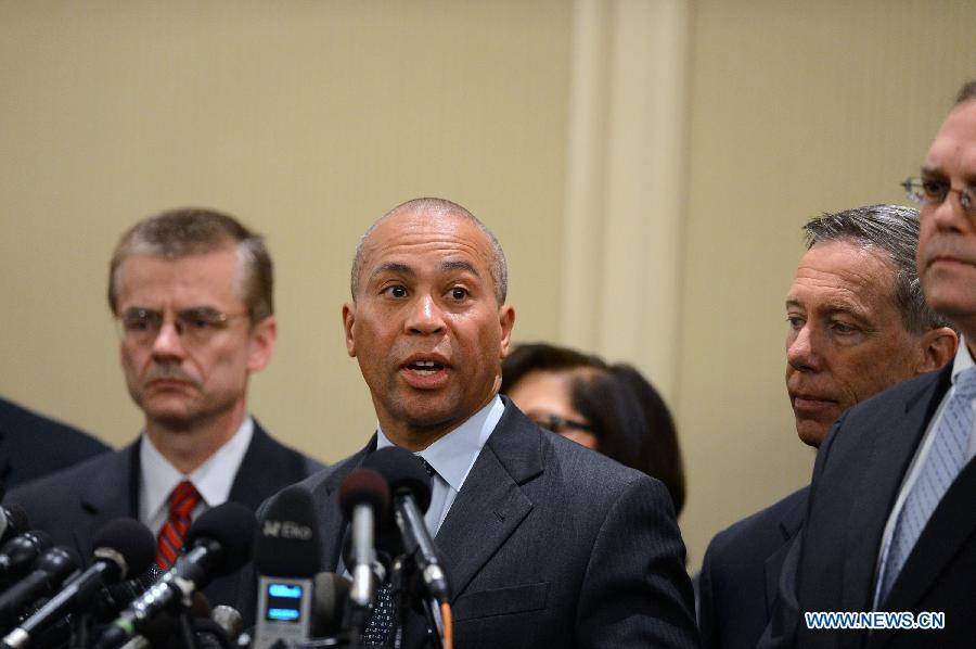 Governor of Massachusetts Deval Patrick (2nd L) attends a press conference in Boston, the United States, April 16, 2013. The death toll has risen to three, with 176 people injured, 17 of whom in critical conditions. (Xinhua/Wang Lei) 