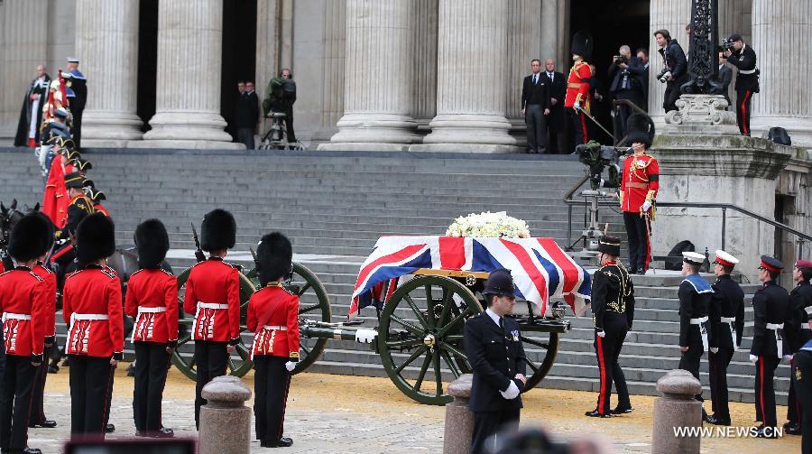 The coffin of British former prime minister Margaret Thatcher is transported to St Paul's Cathedral in London, Britain, April 17, 2013. The funeral of Margaret Thatcher, the first female British prime minister, started 11 a.m. local time on Wednesday in London. (Xinhua/Yin Gang) 