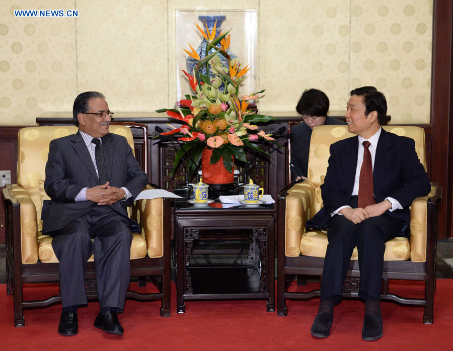 Chinese Vice President Li Yuanchao (R) meets with Chairman of the Unified Communist Party of Nepal (Maoist) Prachanda in Beijing, capital of China, April 17, 2013. (Xinhua/Ma Zhancheng)