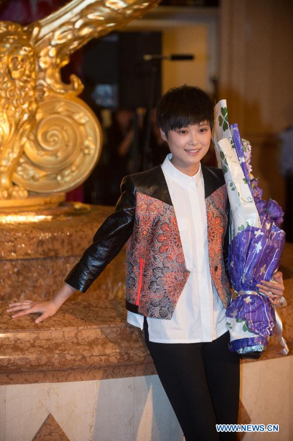 Singer Chris Lee attends the 17th China Music Awards (CMA) and Asian Influential Awards ceremony at Cotai Strip Cotai Arena in Macao, south China, April 18, 2013. (Xinhua/Cheong Kam Ka)
