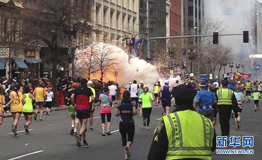 Photo taken on April 15, 2013 shows explosions happened in Boston, the United States. Two explosions occurred near the Boston Marathon finish line, local media reported. (Photo/ Xinhua)