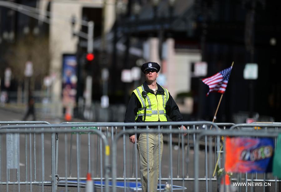 Policemen continue investigations on Boston blasts