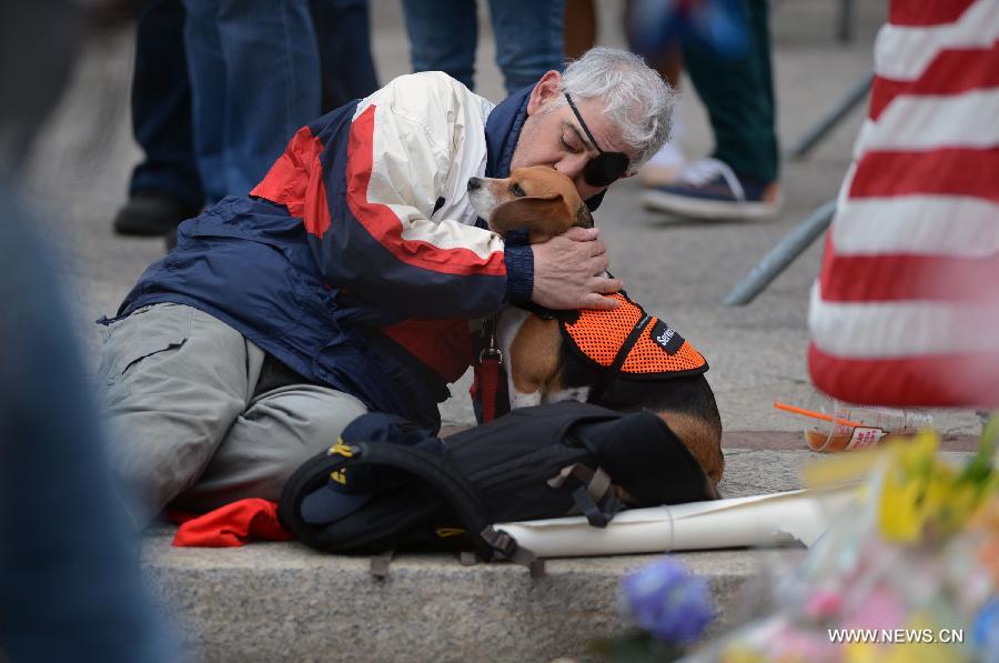 People mourn for victims in Boston Marathon blasts 
