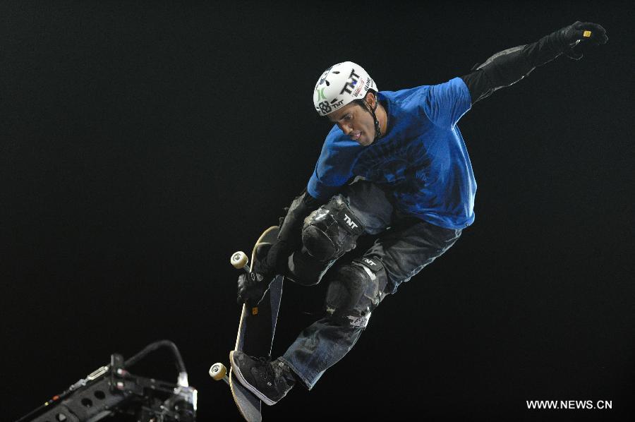 Bob Burnquist of Brazil hops during Skateboard Big Air finals in Foz do Iguacu, Brazil, March, 18, 2013. The XGames opened here Thursday and will last till Sunday. (Xinhua/Weng Xinyang)