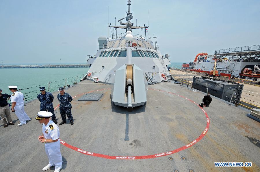 The very first American Littoral Combat Ship (LCS) USS Freedom (LCS 1) arrives in Singapore's Changi Naval Base, on April 18, 2013. The USS Freedom began on Thursday its four-month deployment in Singapore. (Xinhua/Then Chih Wey) 