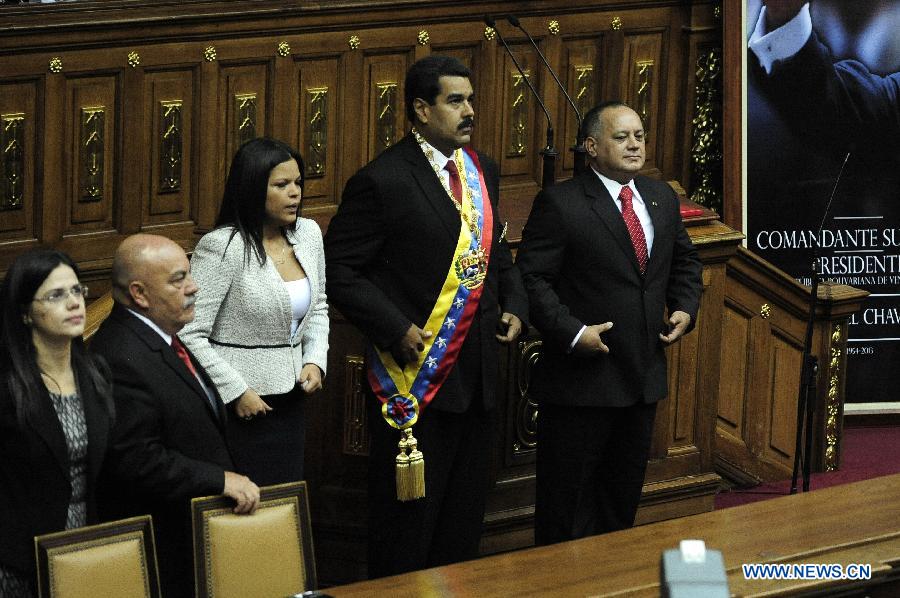 Venezuelan President Nicolas Maduro (2nd R) attends his swearing-in ceremony joined by Venezuela's National Assembly President Diosdado Cabello (1st R) and late President Hugo Chavez's daughter Maria Gabriela Chavez (3rd R) at the headquarters of the Federal Legislative Palace in the city of Caracas, capital of Venezuela, on April 19, 2013. (Xinhua/Mauricio Valenzuela) 