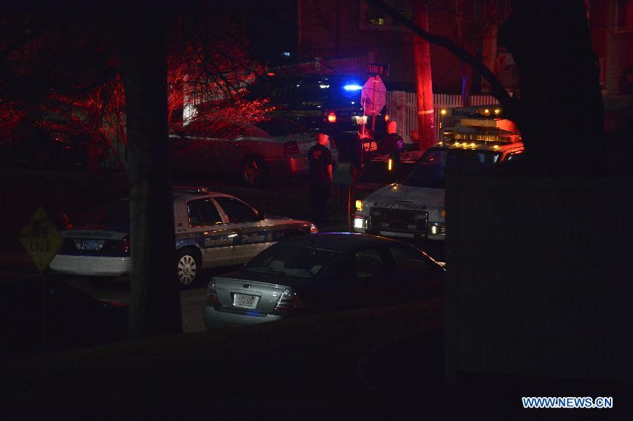 Policemen block Franklin street where a suspect of the Boston bombings hid in the Watertown district of Boston, the United States, April 19, 2013. Suspect of the Boston Marathon bombings, 19-year-old Dzhokhar A. Tsarnaev, was captured on a boat parked on a residential property in Watertown, the state of Massachusetts, on Friday. (Xinhua/Zhang Jun) 