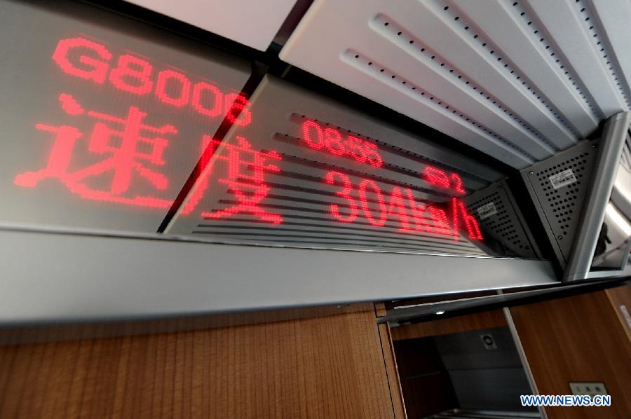 A screen on a train running on the Harbin-Dalian high-speed railway shows the speed of 304 kilometers per hour, April 21, 2013. The Harbin-Dalian High-speed Railway, the world's fastest railway in frigid regions, started its summer schedule as of April 21, with the speed during the summer period (usually from April to November) lifted to 300 kilometers per hour from 200 in the winter period, cutting the shortest running time between Harbin and Dalian from five hours and 18 miniutes to three and half hours. The Harbin-Dalian high-speed railway was open for service on Dec. 1, 2012. (Xinhua/Zhang Nan)
