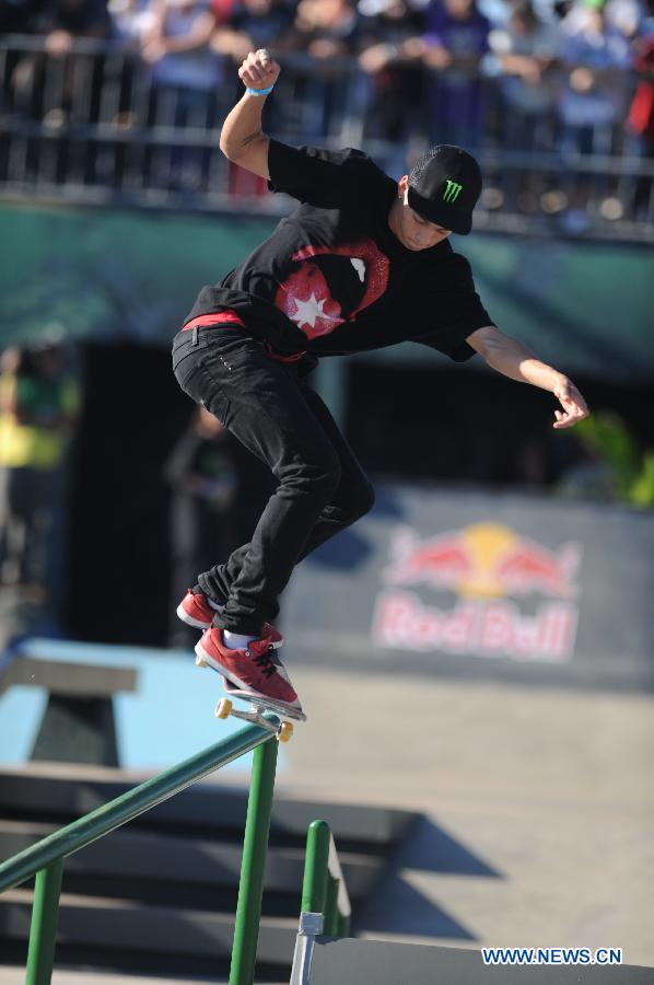 Nyjah Huston of the United States competes in the Street League Skateboarding finals in Foz do Iguacu, Brazil, April, 20, 2013. Nyjah Huston of the United States won in the Street League Skateboarding finals during the X Games. (Xinhua/Weng Xinyang)