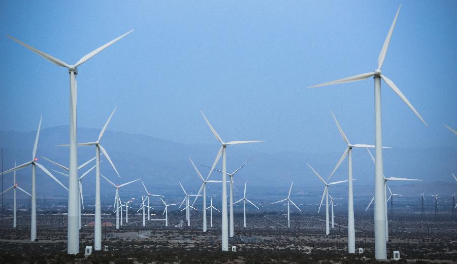 Photo taken on March 17, 2013 shows the wind turbines at Palm Springs in California State, the United States. The American Wind Energy Association (AWEA) released its annual report on April 11, saying that the U.S. has become the world's largest wind energy market. (Xinhua/Yang Lei) 
