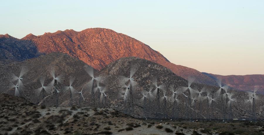 Photo taken on April 19, 2013 shows the wind turbines at Palm Springs in California State, the United States. The American Wind Energy Association (AWEA) released its annual report on April 11, saying that the U.S. has become the world's largest wind energy market. (Xinhua/Yang Lei) 