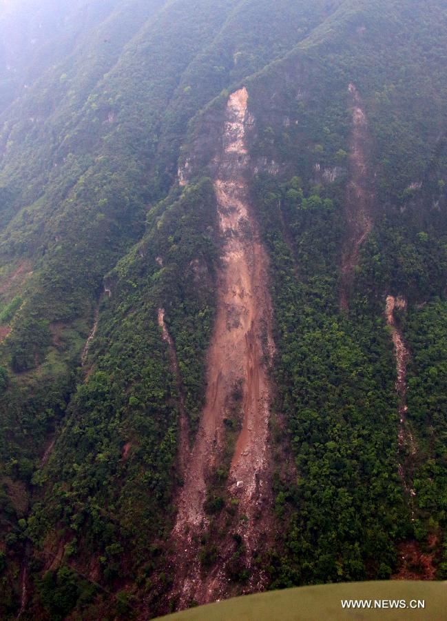 Aerial photo taken on April 21, 2013 shows a landslide site in quake-hit Baoxing County of Ya'an City, in southwest China's Sichuan Province. (Xinhua/Li Gang) 