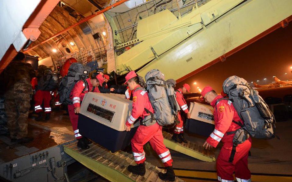 China Int'l Search and Rescue Team fly to Lushan County