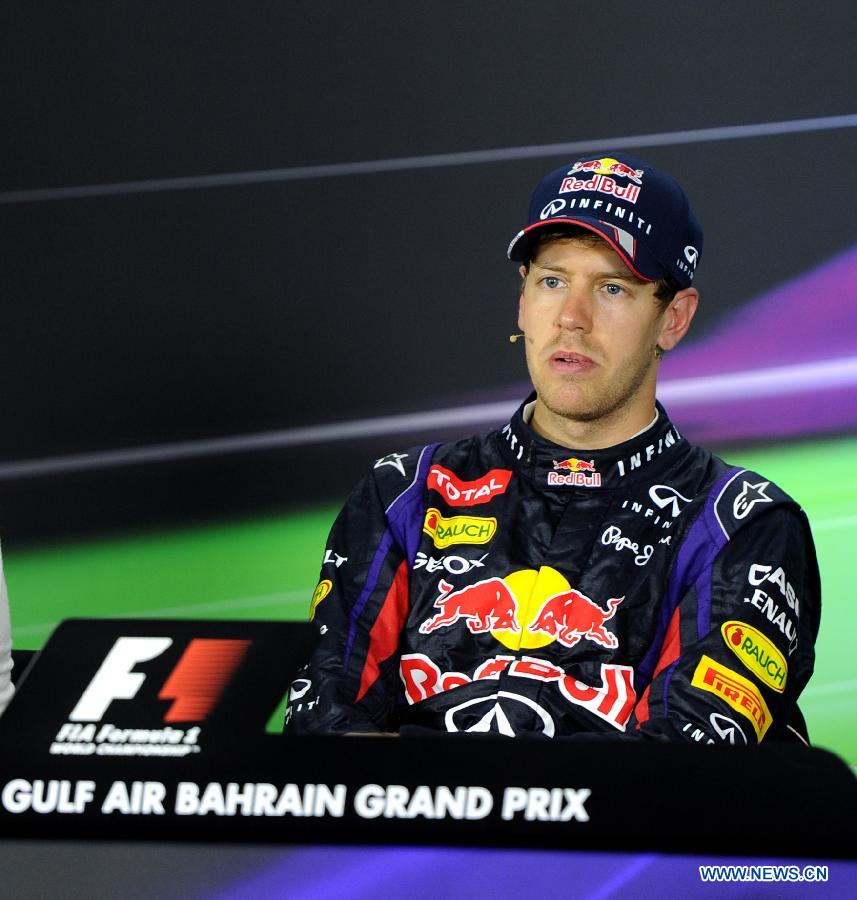 Red Bull driver Sebastian Vettel attends a press conference after the Bahrain F1 Grand Prix at the Bahrain International Circuit in Manama, Bahrain, on April 21, 2013. (Xinhua/Chen Shaojin)