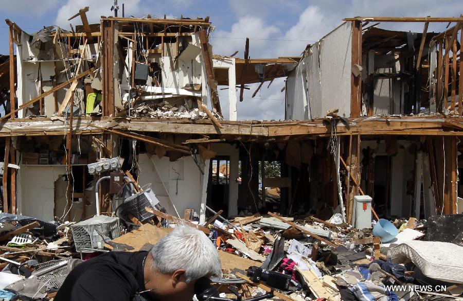 The blast site is seen in West, Texas, the United States, on April 21, 2013. The seat, or center of an explosion that blew off a fertilizer plant and almost razed the U.S. town of West had been located, a U.S. Official said Sunday. Assistant Texas fire marshal Kelly Kistner told a press conference here that the locationing of the center of the explosion is important to the investigation of the blast. But he said the cause of the fire and blast remained unknown. The explosion left a large crater in the middle of the plant, said Kistner, but declined to elaborate on the dimension of the crater or give other details. (Xinhua/Michael Ainsworth)