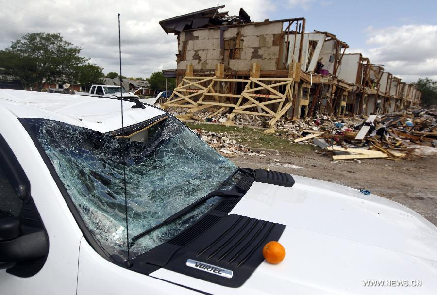 The blast site is seen in West, Texas, the United States, on April 21, 2013. The seat, or center of an explosion that blew off a fertilizer plant and almost razed the U.S. town of West had been located, a U.S. Official said Sunday. Assistant Texas fire marshal Kelly Kistner told a press conference here that the locationing of the center of the explosion is important to the investigation of the blast. But he said the cause of the fire and blast remained unknown. The explosion left a large crater in the middle of the plant, said Kistner, but declined to elaborate on the dimension of the crater or give other details. (Xinhua/Michael Ainsworth)