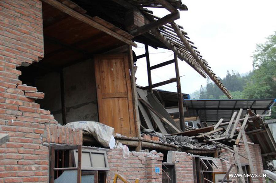 Photo taken on April 21, 2013 shows the damaged house in the quake-hit Xiaoyugou Village of Baoxing County, southwest China's Sichuan Province. The village suffered severe damage in the earthquake as most of the houses were built by villagers and couldn't endure quake. (Xinhua/Xu Qiang)