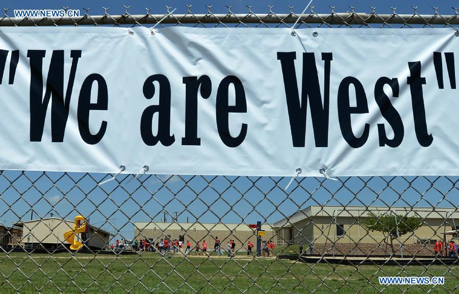 Banner of "We are West" is seen in a school in West, Texas, the United States, April 22, 2013. (Xinhua/Wang Lei) 