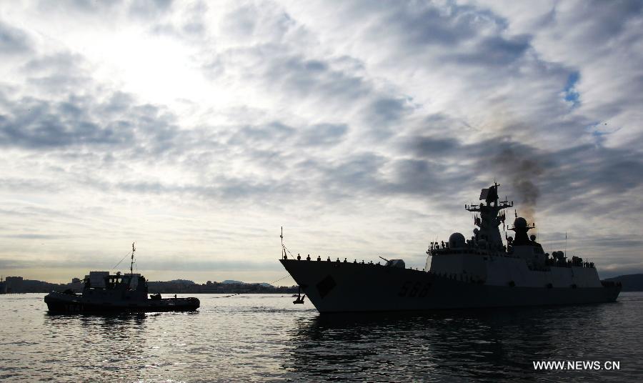 The frigate Huangshan of the 13th naval escort squad sent by the Chinese People's Liberation Army (PLA) Navy arrives at the Toulon harbour in France, April 23, 2013. The 13th convoy fleet including the frigates Huangshan and Hengyang and the supply ship Qinghaihu arrive in Toulon, France on Tuesday, beginning a five-day visit to the country. (Xinhua/Gao Jing) 